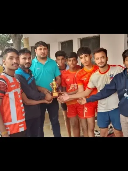 Our team holding a trophy after a successful UP Youth Kabaddi League trial. Their performance as a unit was outstanding.