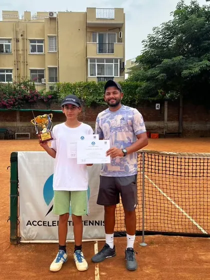 The winner of our academy's Under-14 Singles open tournament. Hosting these events gives my players valuable match experience in a familiar setting.