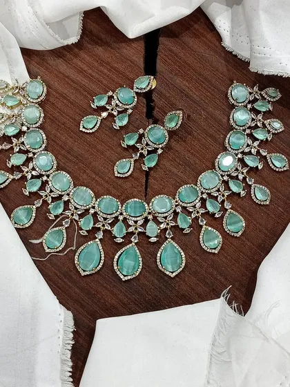 A beautiful sea-green version of the AD necklace.