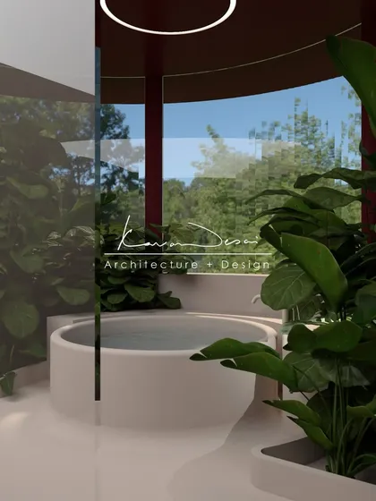 I love using bold color to create drama. This bathroom concept features deep maroon walls and a curved ceiling, creating a rich, cocoon-like feel. The freestanding tub and surrounding greenery make it feel like a spa.