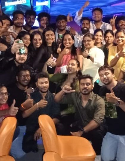 A large corporate group giving a thumbs up after an awesome day of games and fun. We can accommodate big teams for an action-packed day.