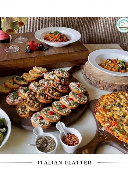 My Italian platter makes for a wonderful Rakhi gift. This spread of bruschetta, pasta, and pizza is a complete meal that allows your family to relax and enjoy the day without worrying about cooking.