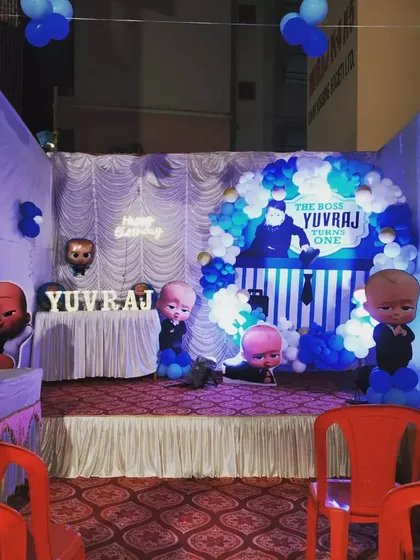 A wider view of the Boss Baby outdoor setup, showing how it can define a party space.