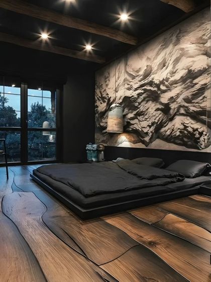 A dramatic and moody bedroom design featuring a low-profile platform bed and dark wood flooring. The focal point is a stunning abstract mural behind the bed, creating a unique and artistic statement.