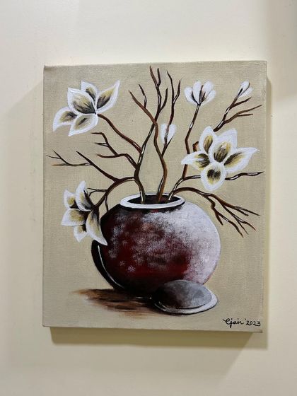 This still life painting of flowers in a vase was done with acrylics. It’s a great example of how we can create realistic textures and shading on canvas.