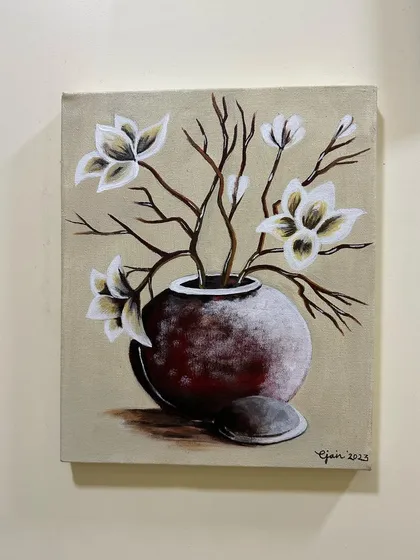 This still life painting of flowers in a vase was done with acrylics. It’s a great example of how we can create realistic textures and shading on canvas.