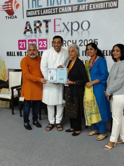 A moment of recognition. Harinder ma'am receiving a certificate at the Art Expo, a testament to her dedication and the quality of her work.
