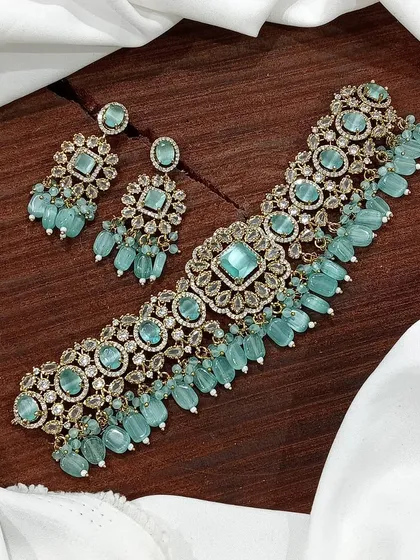 A mint-blue version of the antique gold finish choker.