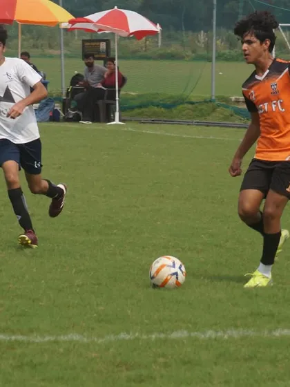 An attacker from our U16 team dribbling at speed during the RSA Cup.