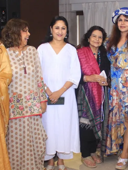 A candid moment with fellow artists at the Heeramandi event, sharing smiles and conversations.