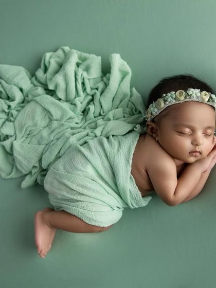 An artistic composition of the side pose, with the wrap flowing out to create a beautiful, dynamic shape.