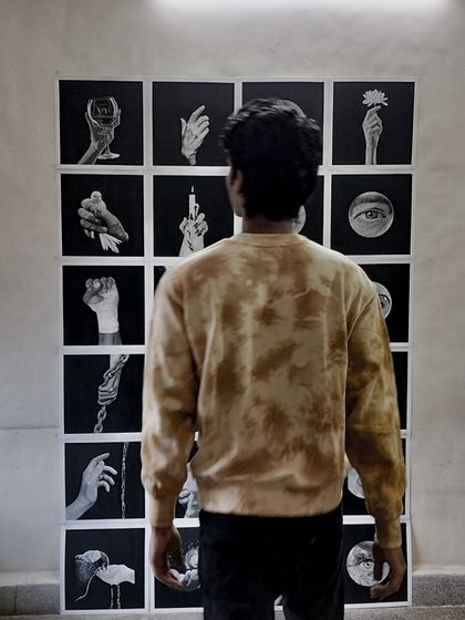 A photo of me looking over the completed 30-day challenge grid. It was a proud moment to see all that hard work come together.