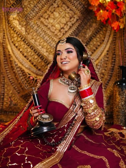 A fun and creative shot for a bridal portfolio, this image combines traditional bridal wear with a vintage prop for a unique look.