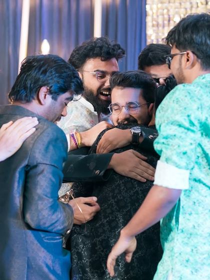 A big group hug on the dance floor. We capture the bonds of friendship that are such an important part of your wedding.