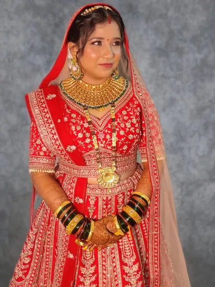 Urmila looking elegant and poised, ready for her reception.