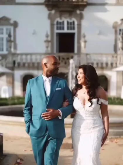 A beautiful moment between a bride and groom, with his custom teal suit providing a vibrant splash of color. This ensemble proves that wedding attire can be both personal and exceptionally stylish.