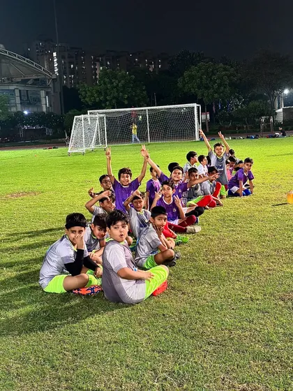 All smiles here. A group of our young players taking a break during a night training session.