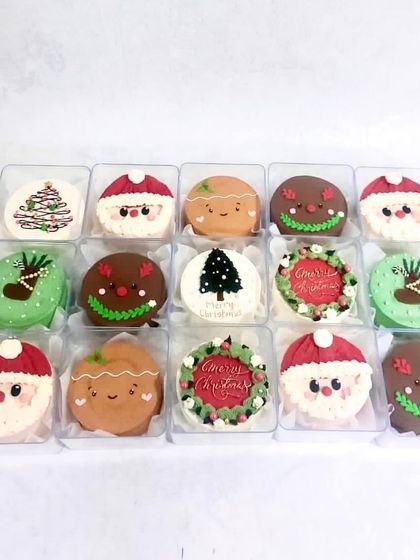 Our Christmas-themed mini bento cakes, featuring Santa, reindeer, Christmas trees, and gingerbread men. We even used special festive flavours for these.