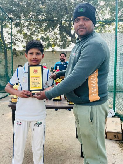 Shatrudhan with his Best Bowler of the Tournament trophy.