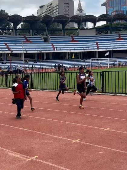 Our young athletes competing in a running event at the kids' athletics meet at Kanteerava Stadium.