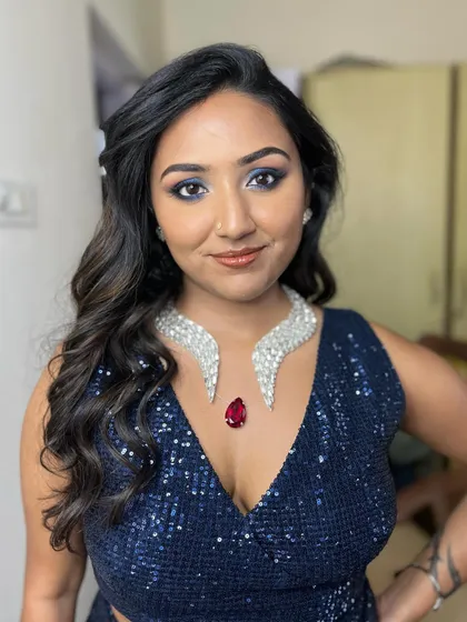 Nimisha looking confident and beautiful. The blue smokey eye is the star of the show, perfectly complementing her navy sequin outfit.