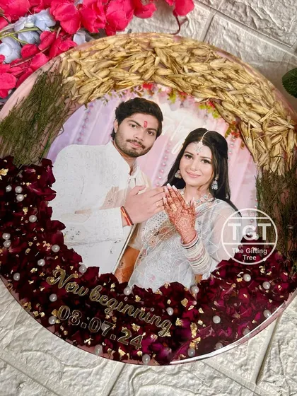 This angled shot highlights the pearls and gold flakes scattered among the preserved red flowers.