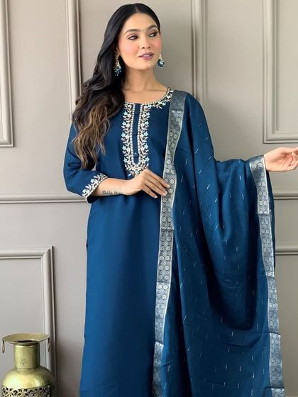 This blue viscose chanderi kurta has such a classy vibe. The heavy thread embroidery on the neckline and cuffs adds a touch of elegance to a simple silhouette.