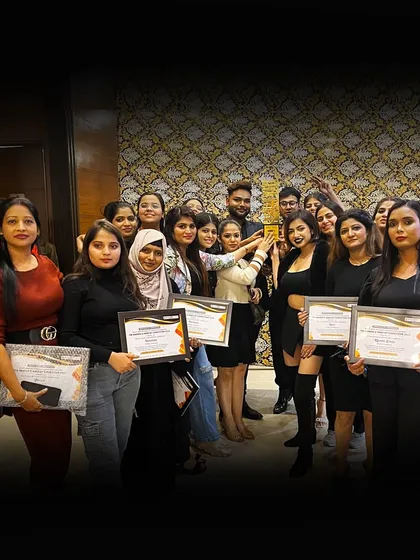 Celebrating success with certificates and a trophy. We take pride in our students' achievements and the real-world opportunities we provide them.