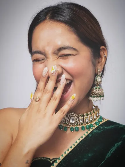 Capturing a moment of pure, uninhibited laughter during an ethnic wear shoot. These candid shots bring life to a brand's campaign and make the model relatable.