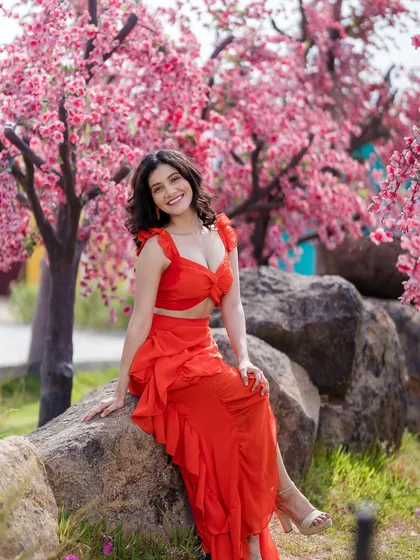 Add a pop of color to your pre-wedding shoot with this vibrant red ruffled co-ord set. It’s fun, flirty, and photographs beautifully, making it a popular choice for couples looking for stylish pre-wedding outfits.