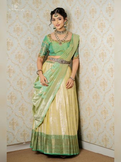 Another full-length portrait showcasing the beautiful silhouette of the lehenga and the detailed styling.