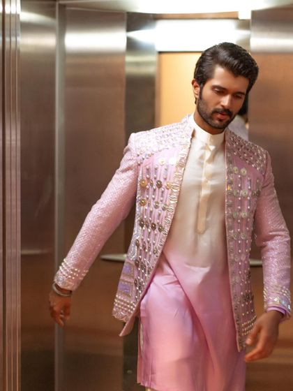 For the 'Kushi' promotions, I wanted a look that was playful and modern. I styled Vijay Deverakonda in this lilac embellished jacket by Papa Don't Preach, pushing the boundaries of men's ethnic wear.
