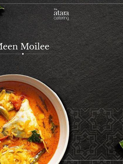 Meen Moilee, a delicate fish curry from Kerala. This dish features fish simmered in a creamy coconut milk sauce with mild spices.