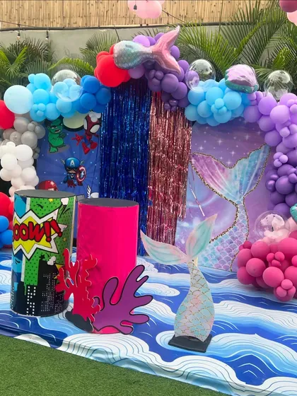 We can even mix and match themes. This unique party combined the magic of mermaids with the action of superheroes.