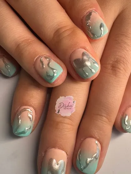 A cool and modern design with a mint green and silver chrome flame effect.