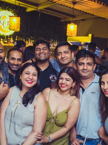 A great group photo of guests enjoying their night out. It's all about creating a fun, social atmosphere.