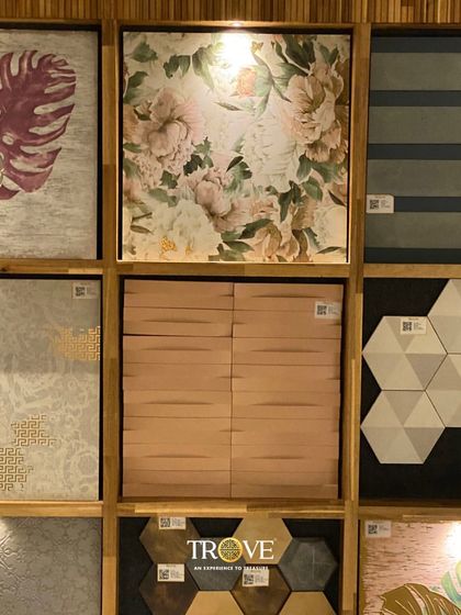 Explore a variety of feature tiles, from soft floral prints and botanical leaf patterns to modern geometric and textured wood-look designs. Each one is designed to create a unique statement.