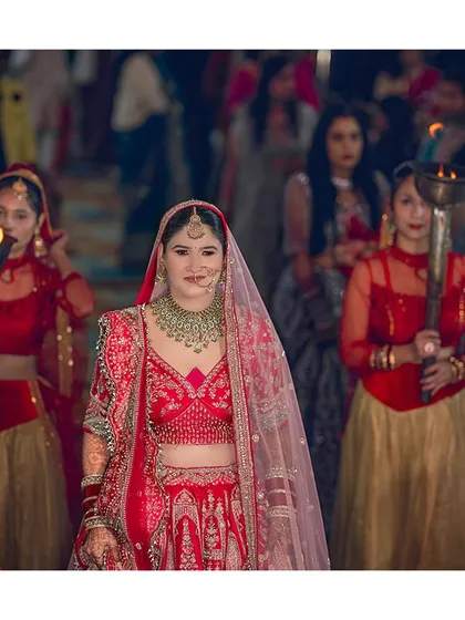 The moment the world stops. I live for capturing these grand bridal entries, where the heroine of our film makes her entrance. The lights, the colours, the emotions, it's pure magic.