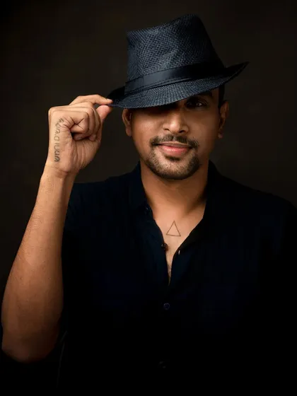 This portrait session was a gift from a dear friend. This gentleman came to the studio with a vision, and we had a great time experimenting with different looks, like this one with a classic fedora.