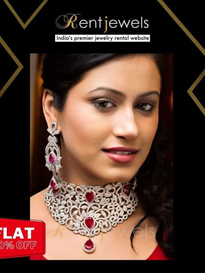 I love this opulent diamond choker with ruby-red stones. It's a perfect fusion of modern sparkle and traditional color, ideal for a bride's reception look.