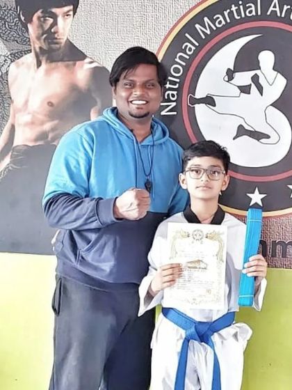 National Martial Arts and Fitness Academy - Kids Martial Arts & Fitness The Journey of Discipline: Belt Graduations photo 34