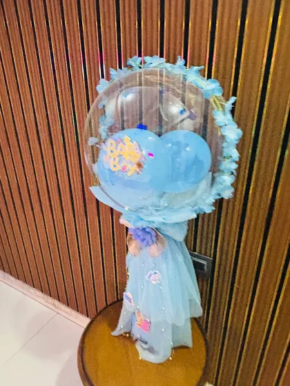 A beautiful custom balloon bouquet, perfect as a gift or decor for a 'Welcome Baby' celebration.