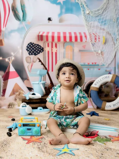 The wide-eyed wonder of a toddler exploring a new and exciting "beach" environment.