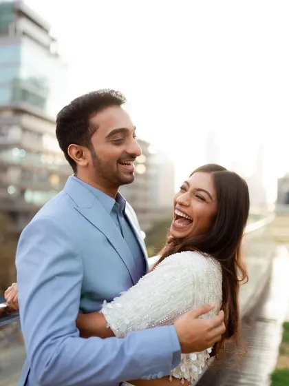 This is the kind of laughter I live to capture. This candid shot of Aayushi and Harshit during their urban shoot in Mumbai is proof that the best pre-wedding photos are the ones where you forget the camera is even there.