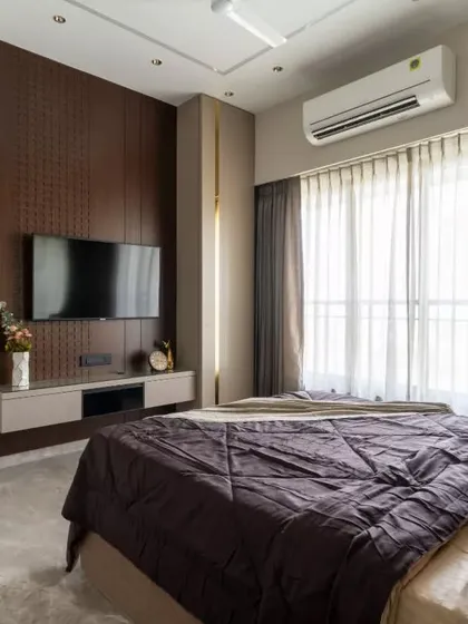 Step into luxury and serenity with this modern bedroom oasis. A perfect harmony of rich wooden accents, soft neutrals, and flowing natural light creates the perfect blend of warmth and sophistication.