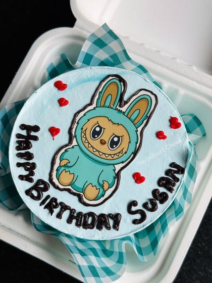 A cute monster character bento cake for a birthday. I love creating these fun, custom drawings.