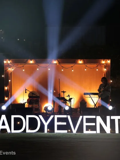 The stage is set, the lights are perfect, and our brand stands proudly at the forefront. This custom stage setup, complete with our signature light-up marquee, represents our promise to deliver a polished, branded, and spectacular event experience every single time.