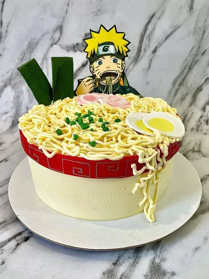 Is it cake or is it ramen? This Naruto-themed cake was designed to look just like a steaming bowl of ramen. The noodles are piped buttercream, and all the toppings are crafted from fondant for a truly unique anime cake.