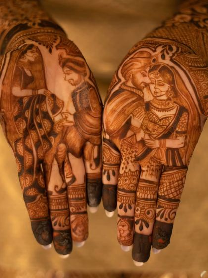 A close-up of the rich, dark stain on a portrait mehandi. We use 100% natural henna to ensure a beautiful and long-lasting color for your special day.