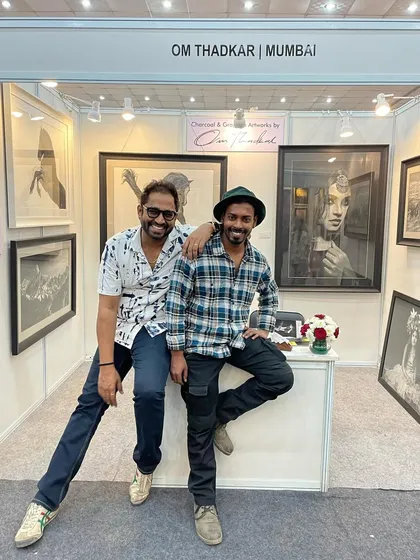 A fun moment with a friend and fellow artist at my exhibition booth in Mumbai.